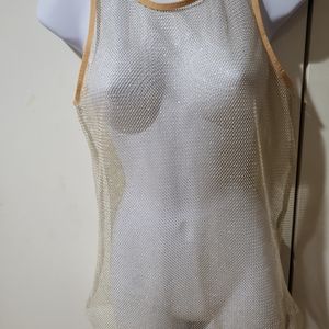 Free people size medium tank top  gold
